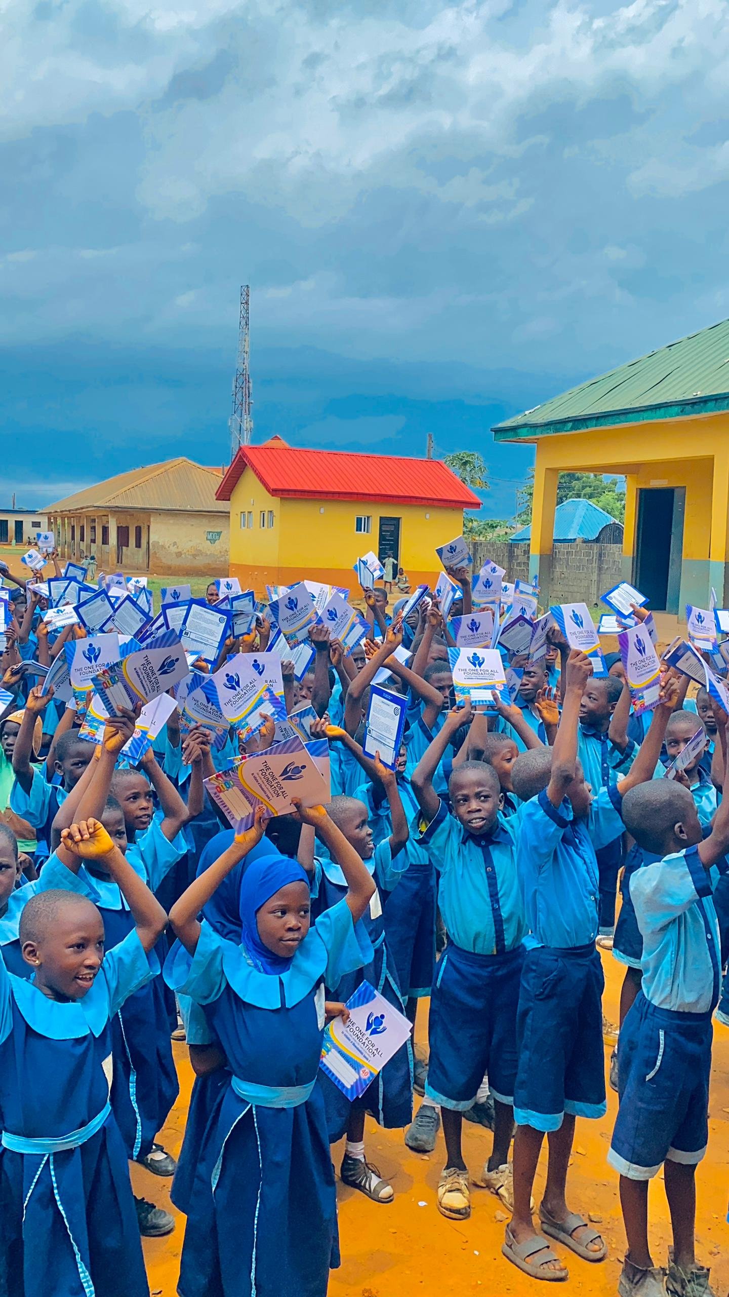 Students celebrating Educational Literacy Project 2.0 materials